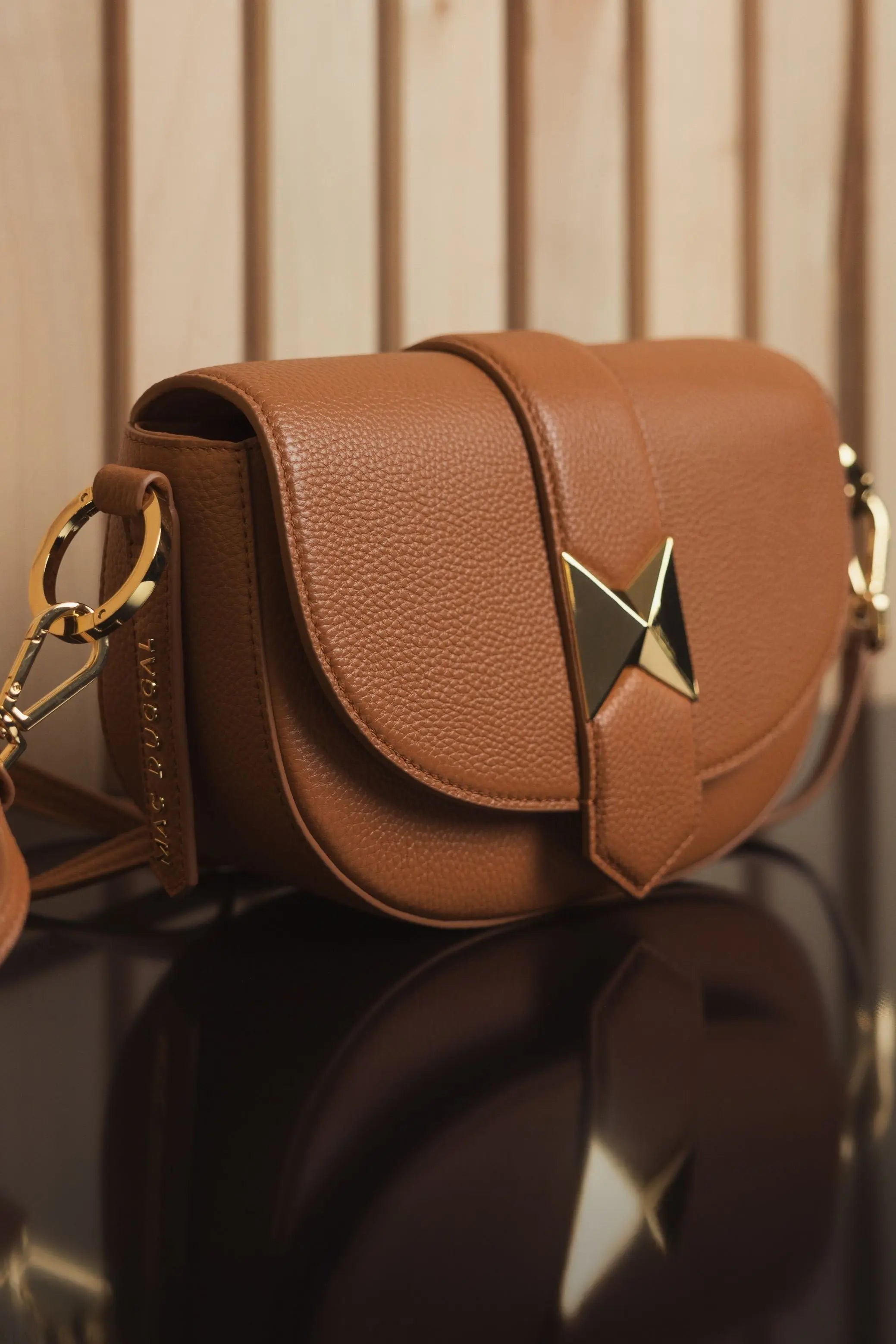 Brown Grain Leather Saddle Bag With Gold Hardware